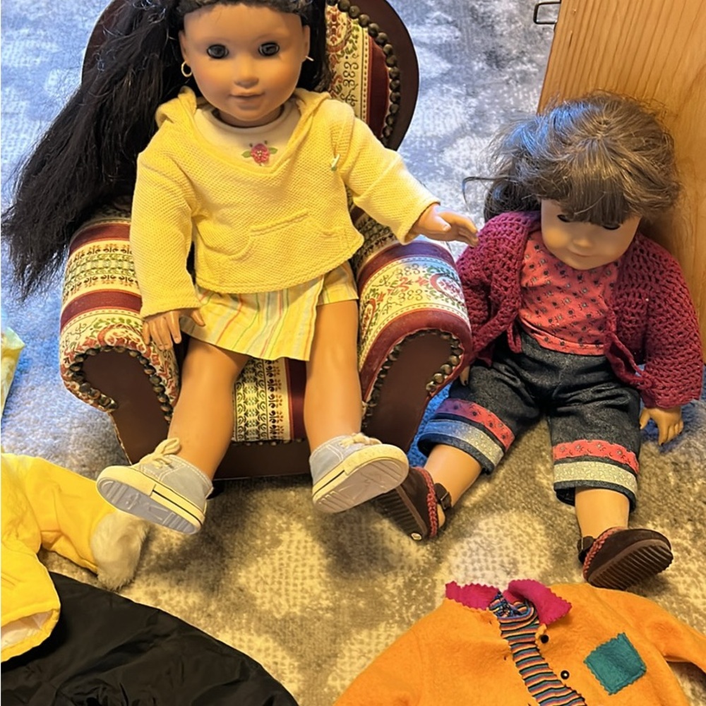American Girl Dolls with all outfits and wing back doll chair